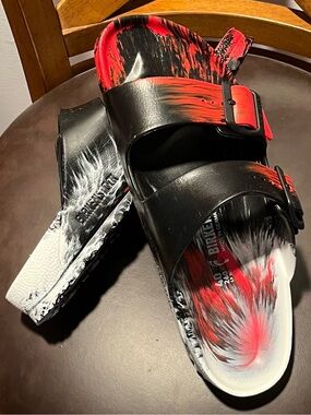 Birkenstock Black Slides with Red and White Paint-Splash (NWOT). Size 7M  9W